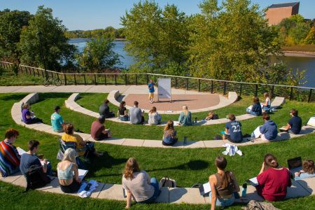 outdoor classroom full of students on a sunny day 