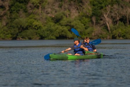 Two students kayak on the Chippewa River.