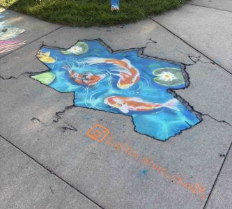 Chalk drawing of koi fish- winner of Chalkfest adult category