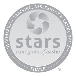 A circular seal showing a silver award sticker for the AASHE STARS program.