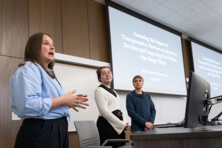 A group of students present their Social Work project to the class.