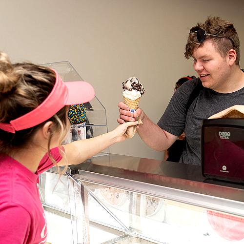 student getting ice cream cone at Olson's 