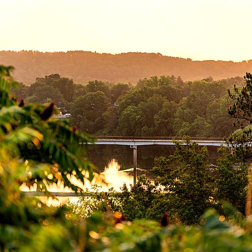 Drone shot of campus and bridge 