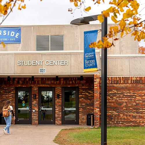 Student walking into UW-Eau Claire – Barron County student center