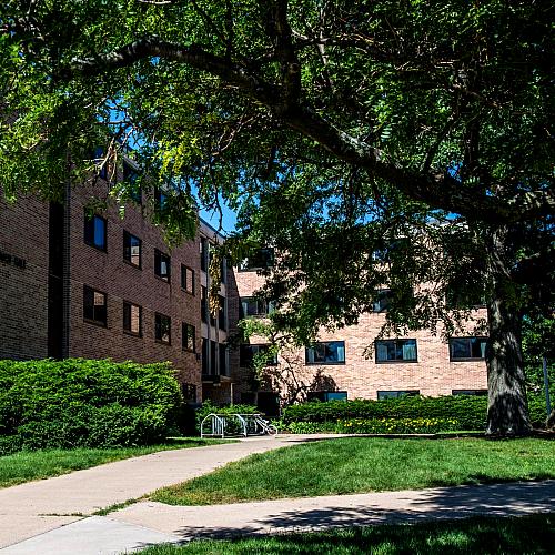 Exterior image of Bridgman Hall including walkway